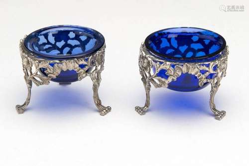 A pair of Dutch silver salt cellars with blue glass liners, ...