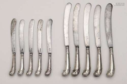 Twelve Dutch silver table and six dessert pistol handle kniv...