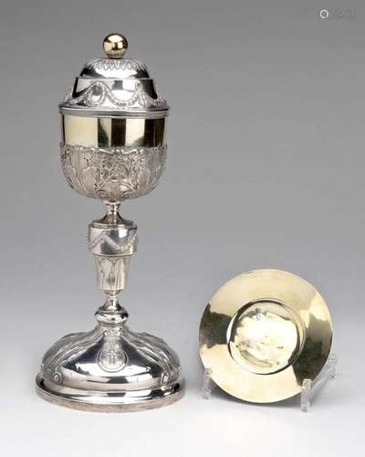 A silver and gilt ciborium and patten