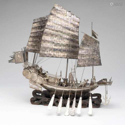 A silver model of a Chinese sampan