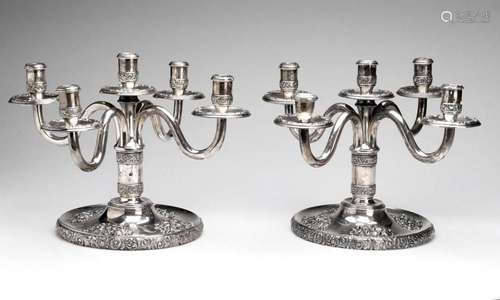 A pair of Spanish silver candelabra