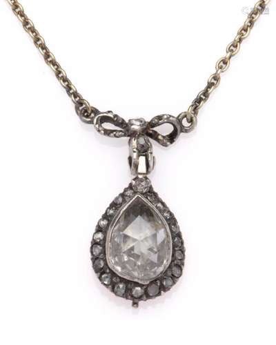 An antique 14k gold and silver diamond pendant on chain