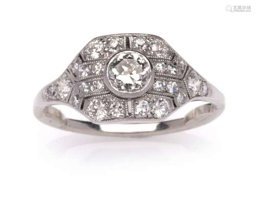 A platinum and 14k gold diamond ring