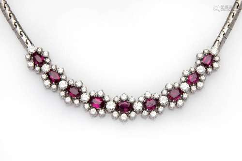 An 18k white gold ruby and diamond necklace