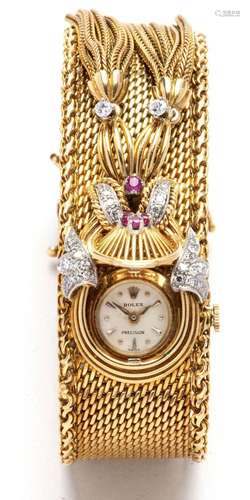 An 18k gold gem set watch bracelet, by Carl Bucherer and Rol...