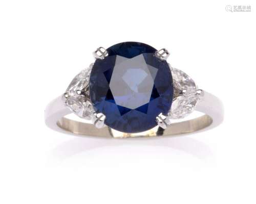 An 18k white gold sapphire and diamond ring