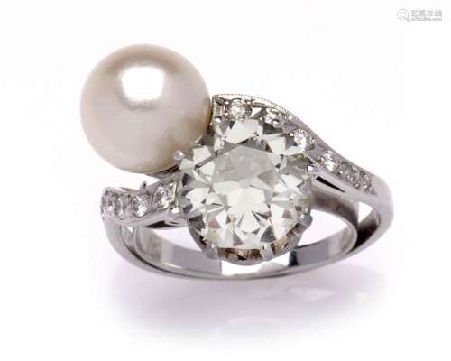 A 14k white gold cultured pearl and diamond "toi et moi...