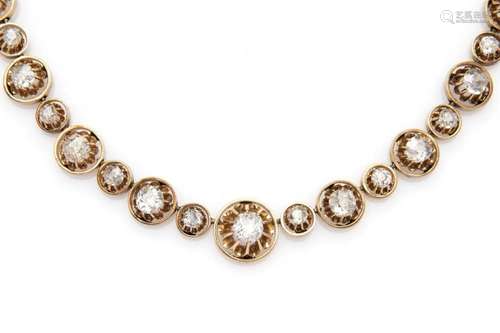 An antique 14k gold and silver diamond necklace