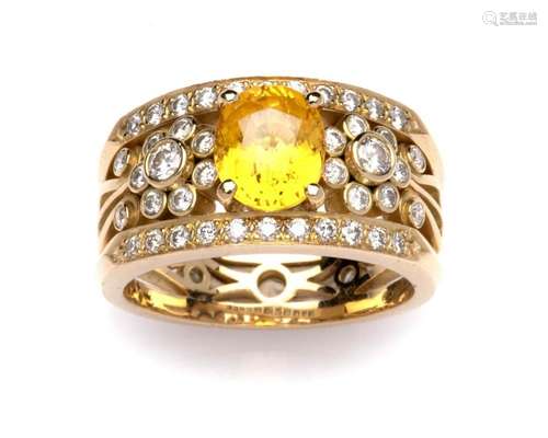 An 18k gold yellow sapphire and diamond ring, by Steltman