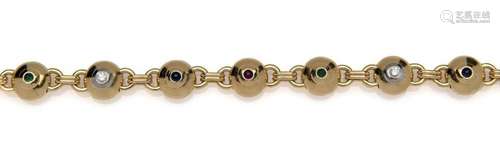 An 18k gold gem set bracelet