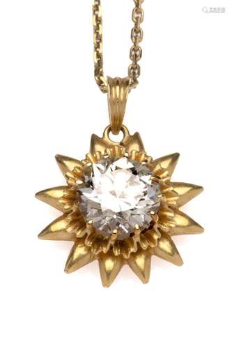 A diamond single stone pendant on a chain.