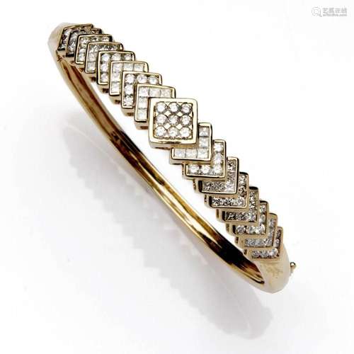 A 14k gold diamond bangle