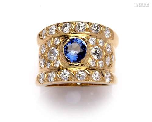 An 18k gold sapphire and diamond band ring