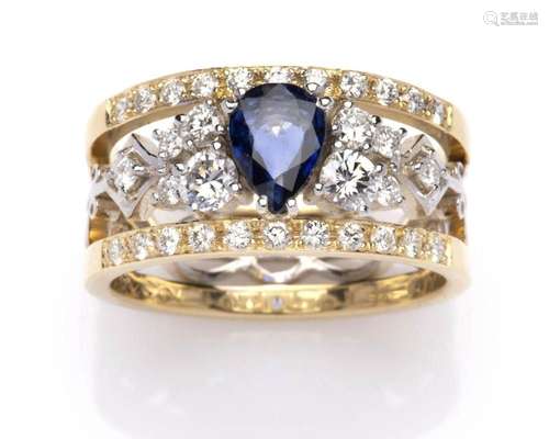 An 18k two colour gold sapphire and diamond ring