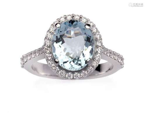 An aquamarine and diamond ring