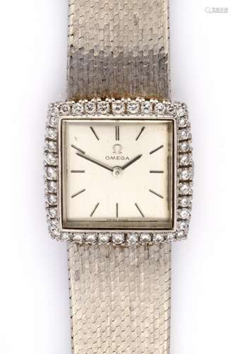 An 18k white gold diamond wristwatch, by Omega