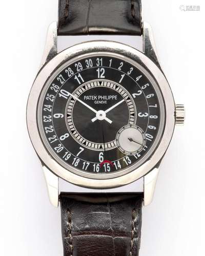 An 18k white gold gentlemen s wristwatch with date, by Patek...