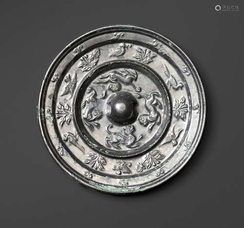 A SILVERED BRONZE 'MYTHICAL BEASTS' MIRROR, TANG D...