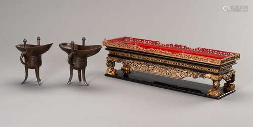 A RARE PAIR OF ARCHAISTIC BRONZE JUE QIANLONG MARK AND PERIO...