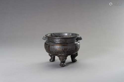 AN ARCHAISTIC MING-STYLE BRONZE TRIPOD CENSER