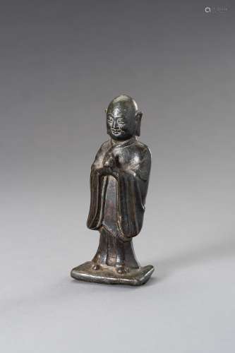 A BRONZE FIGURE OF A MONK, QING DYNASTY