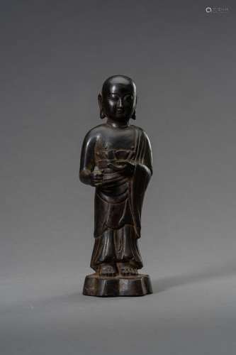 A BRONZE FIGURE OF A STANDING MONK, 19th CENTURY