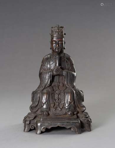 A MING-STYLE BRONZE FIGURE OF A DIGNITARY