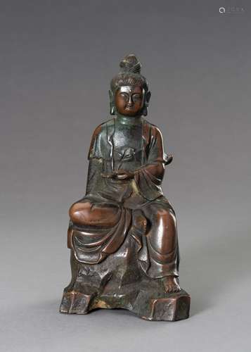 A BRONZE FIGURE OF GUANYIN