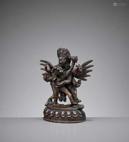 A SILVER-INLAID BRONZE FIGURE OF HERUKA AND CONSORT, QING