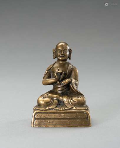 A BRONZE FIGURE OF A LAMA, 19th CENTURY