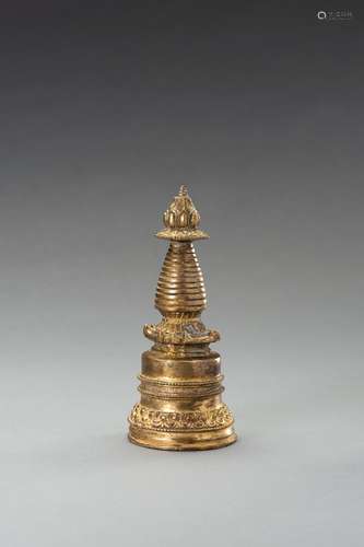 A TIBETO-CHINESE GILT BRONZE STUPA, 20TH CENTURY