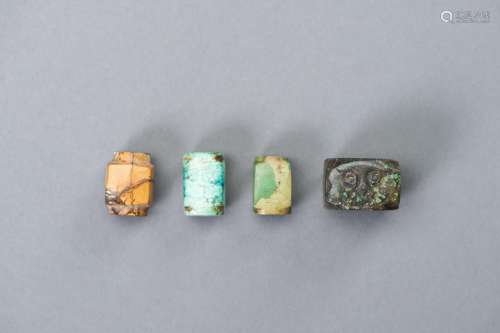 A SET OF FOUR MINIATURE CONG BEADS, MING DYNASTY
