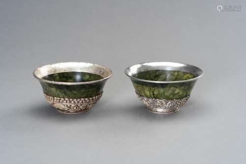 A PAIR OF SILVER MOUNTED SPINACH-GREEN JADE BOWLS
