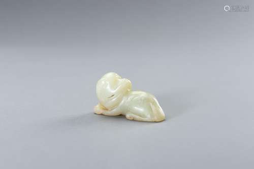 A PALE CELADON JADE FIGURE OF A DOG