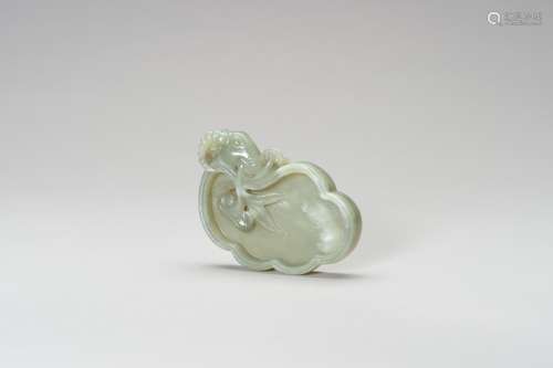 A CARVED CELADON JADE LINGZHI-FORM BRUSH WASHER WITH A RAM