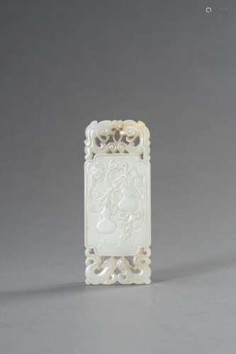 † A WHITE JADE 'DOUBLE GOURD' PLAQUE, 1930s