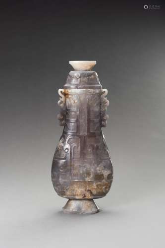 A LILAC-GRAY JADE ARCHAISTIC VASE AND COVER, HU, 20TH CENTUR...