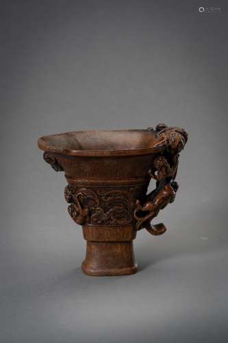 † AN ARCHAISTIC BAMBOO LIBATION CUP, QING DYNASTY