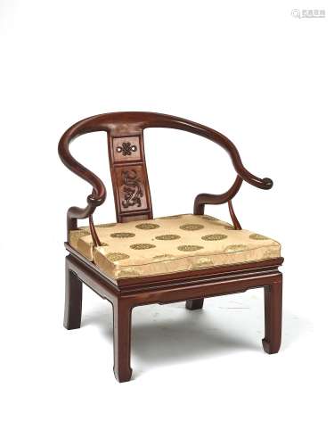 † A CHINESE 'HORSESHOE' LOW CHAIR, LATE QING DYNAS...