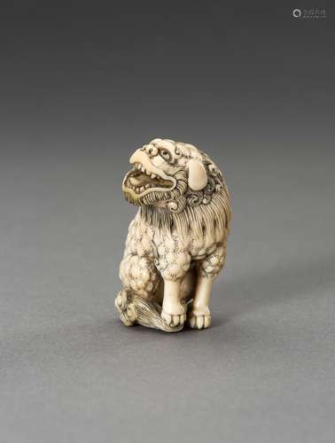 Ɏ MASAYUME: A MARINE IVORY NETSUKE OF A SHISHI