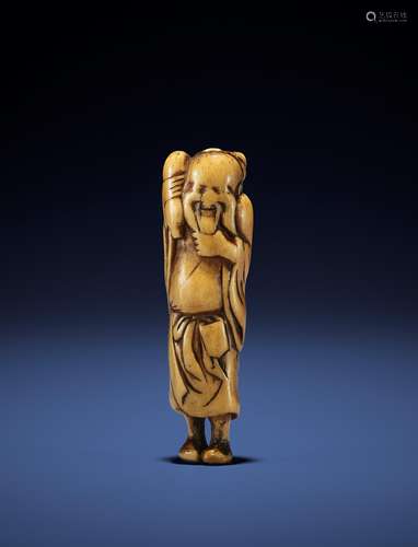 A STAG ANTLER NETSUKE OF A SENNIN