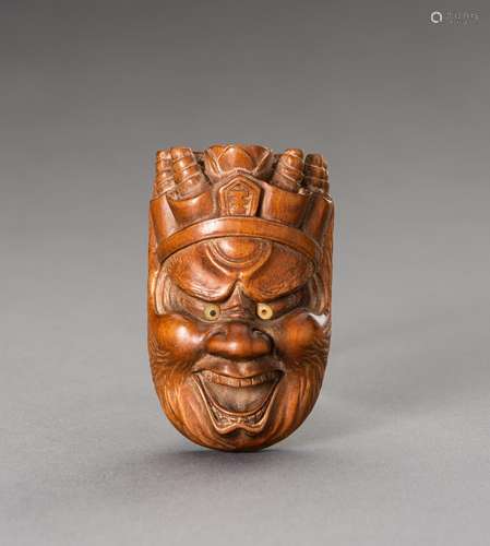 HOZAN: A WOOD NETSUKE OF EMMA-O