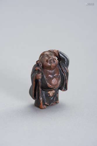 A FINE WOOD AND LACQUER NETSUKE OF HOTEI