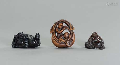 A GROUP OF THREE NETSUKE OF HOTEI AND KARAKO