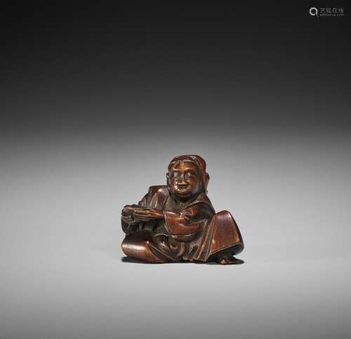 MASAYUKI: AN AMUSING WOOD NETSUKE OF A DRUNK ACTOR