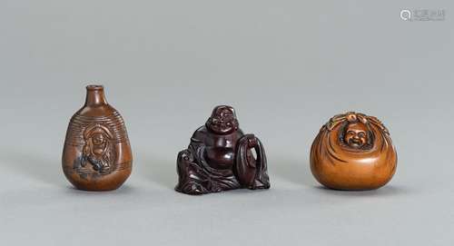 A GROUP OF THREE WOOD NETSUKE OF HOTEI AND DAIKOKU