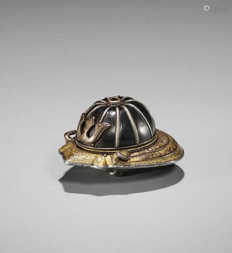 A SILVER AND MIXED-METAL NETSUKE OF A KABUTO