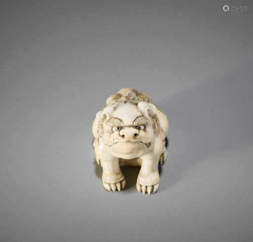 Ɏ A FINE IVORY NETSUKE OF A SHISHI, ATTRIBUTED TO RENSAI