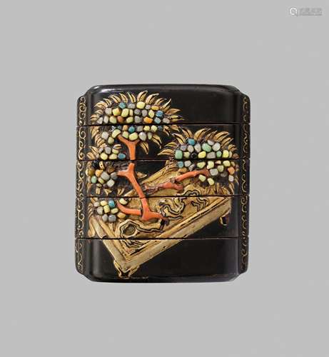 AN UNUSUAL INLAID BLACK AND GOLD LACQUER FOUR-CASE INRO DEPI...