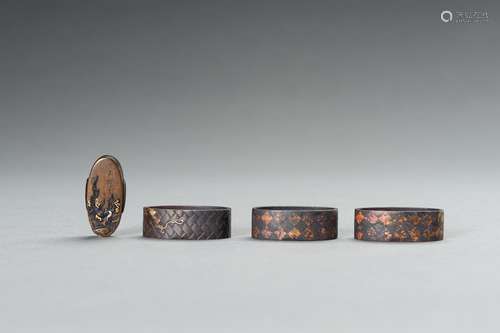 A SET OF THREE FUCHI AND ONE KASHIRA